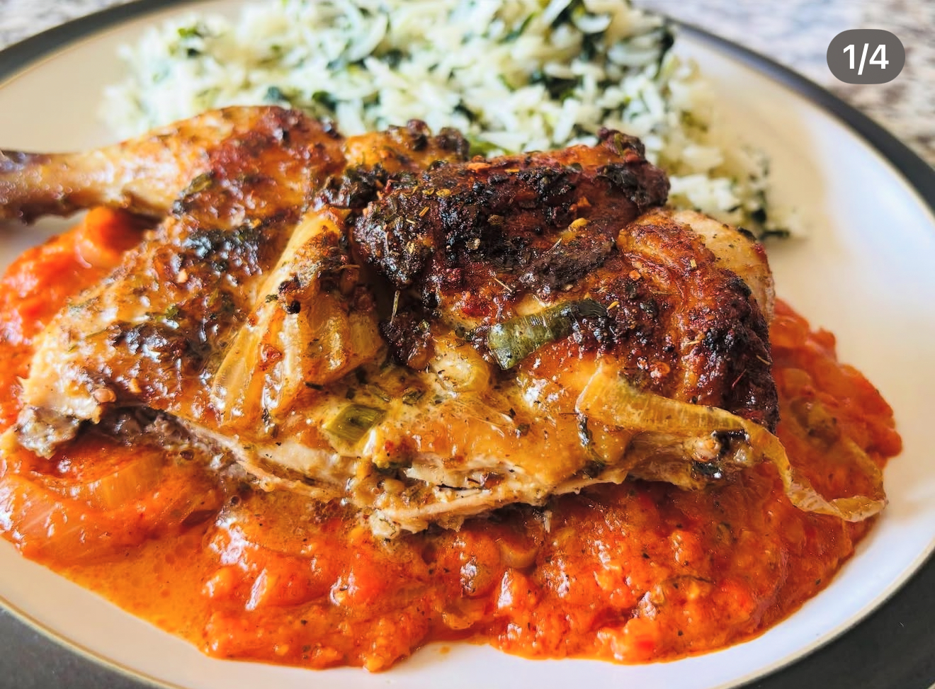 Grilled chicken with rice and tomato sauce